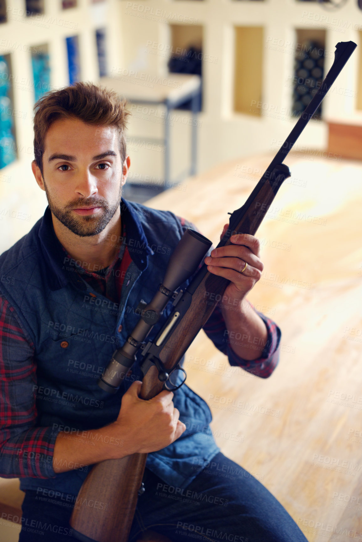 Buy stock photo Hunter, weapon and portrait of man with gun for game shooting, adventure and hobby with confidence. Sports home and serious face of person in cabin with rifle, pride and sportswear for hunting