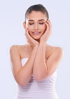 Buy stock photo Happy woman, eyes closed and hands on face for beauty, glow and wellness with dermatology for skin on white background. Natural cosmetics, skincare and calm with self care, shine and facial in studio