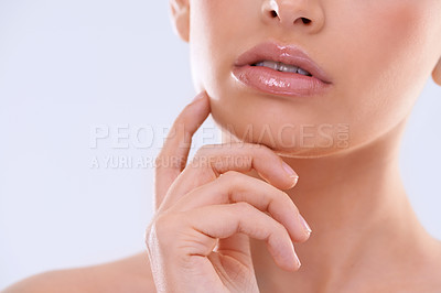 Buy stock photo Hand, face and lips with woman for beauty, makeup with shine and cosmetics isolated on white background. Skin, lipstick or balm for moisturizer, skincare and glow for wellness with closeup in studio