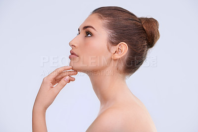 Buy stock photo Beauty, thinking and profile of woman with skincare, wellness and benefits of cosmetics in studio. Dermatology, facial and girl with natural makeup, healthy glow and skin care on white background