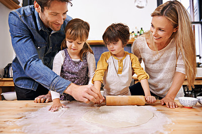 Buy stock photo Happy, family and baking pizza in kitchen together, counter with pastry and sauce for Italian food for summer. Smile, parents and children helping or support in preparation process in home for fun