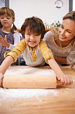 Buy stock photo Mother, children and rolling pin with dough in kitchen for pizza, young and growing up for adolescent and family. Mom, kids and smile with flour for food and roll for fun, bonding and joy in holiday