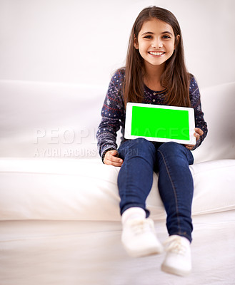 Buy stock photo Portrait, green screen or child with tablet for mockup, playing games or streaming videos on movie website. Space, house or happy kid with smile or technology to download on social media app on sofa