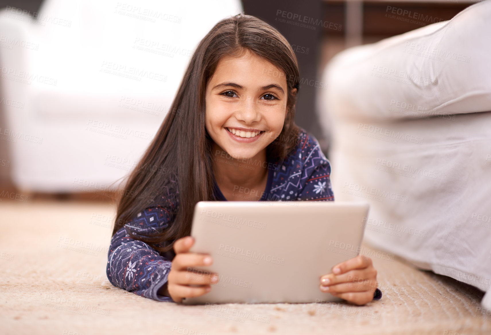 Buy stock photo Floor, portrait or child with tablet for streaming, playing games or watching fun videos on movie website. Girl, house or happy kid with technology to download online or social media app to relax