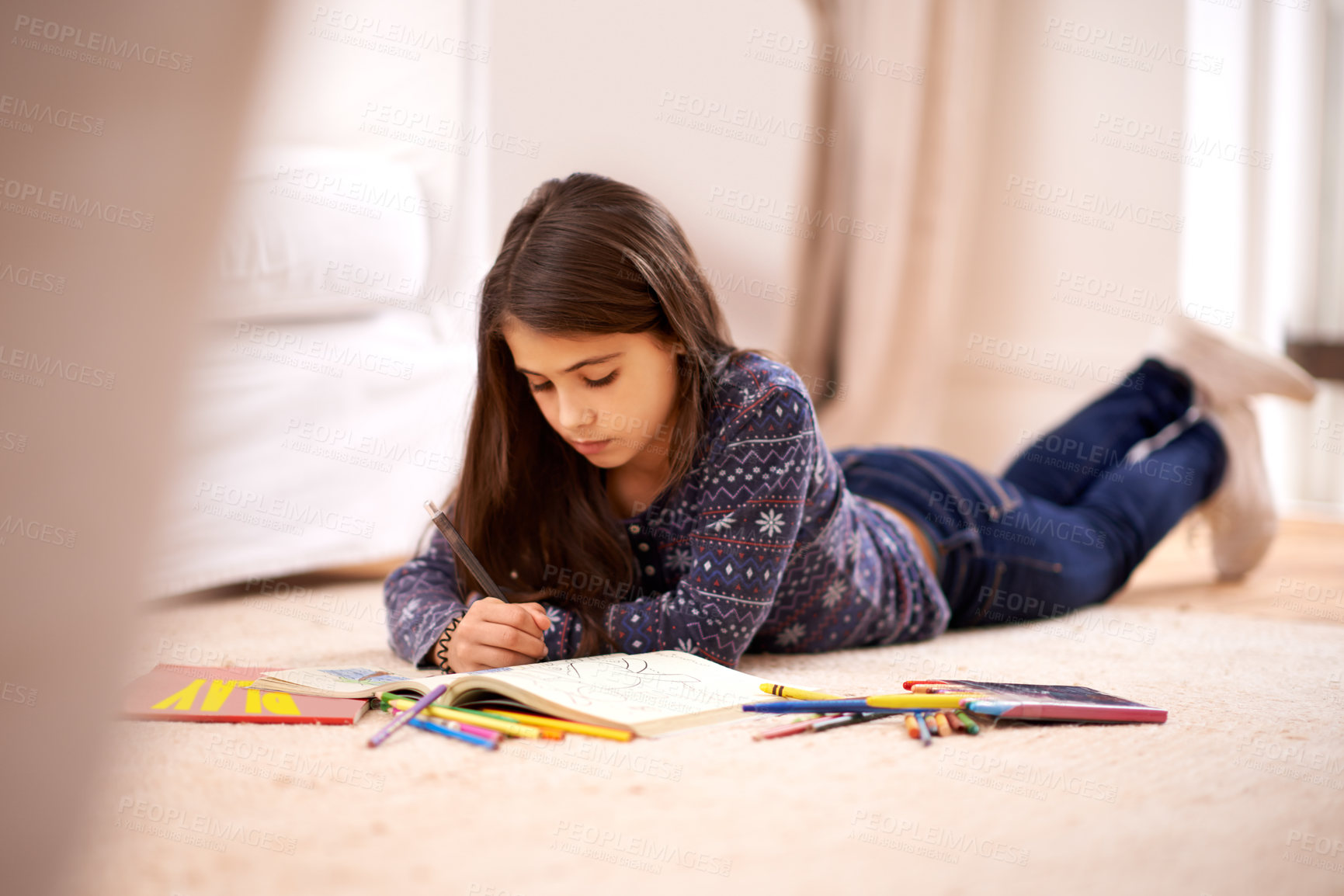 Buy stock photo Girl, coloring book and pencil on floor for sketch in home for learning, development or drawing in lounge. Kid, art and education for studying, creativity or relax on carpet at family house in Madrid