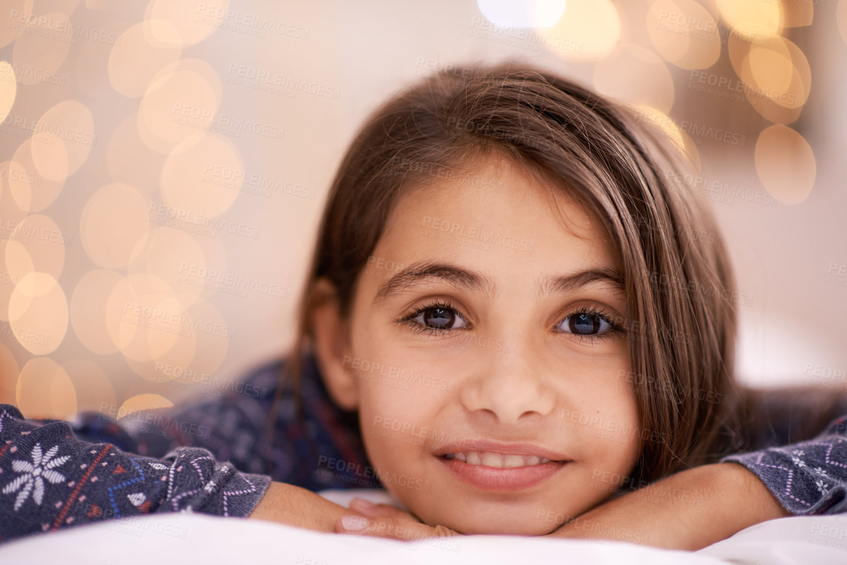 Buy stock photo Children, portrait and happy girl relax in a house for vacation, resting or break with light and bokeh background. Face, smile and innocent female kid person in a living room for holiday or weekend 
