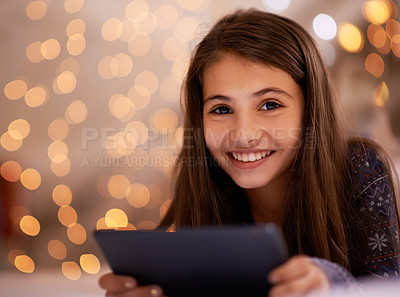 Buy stock photo Portrait, night or girl with tablet for streaming, playing games or watching videos on a movie website. Smile, house or happy child with technology to download online or social media app to relax