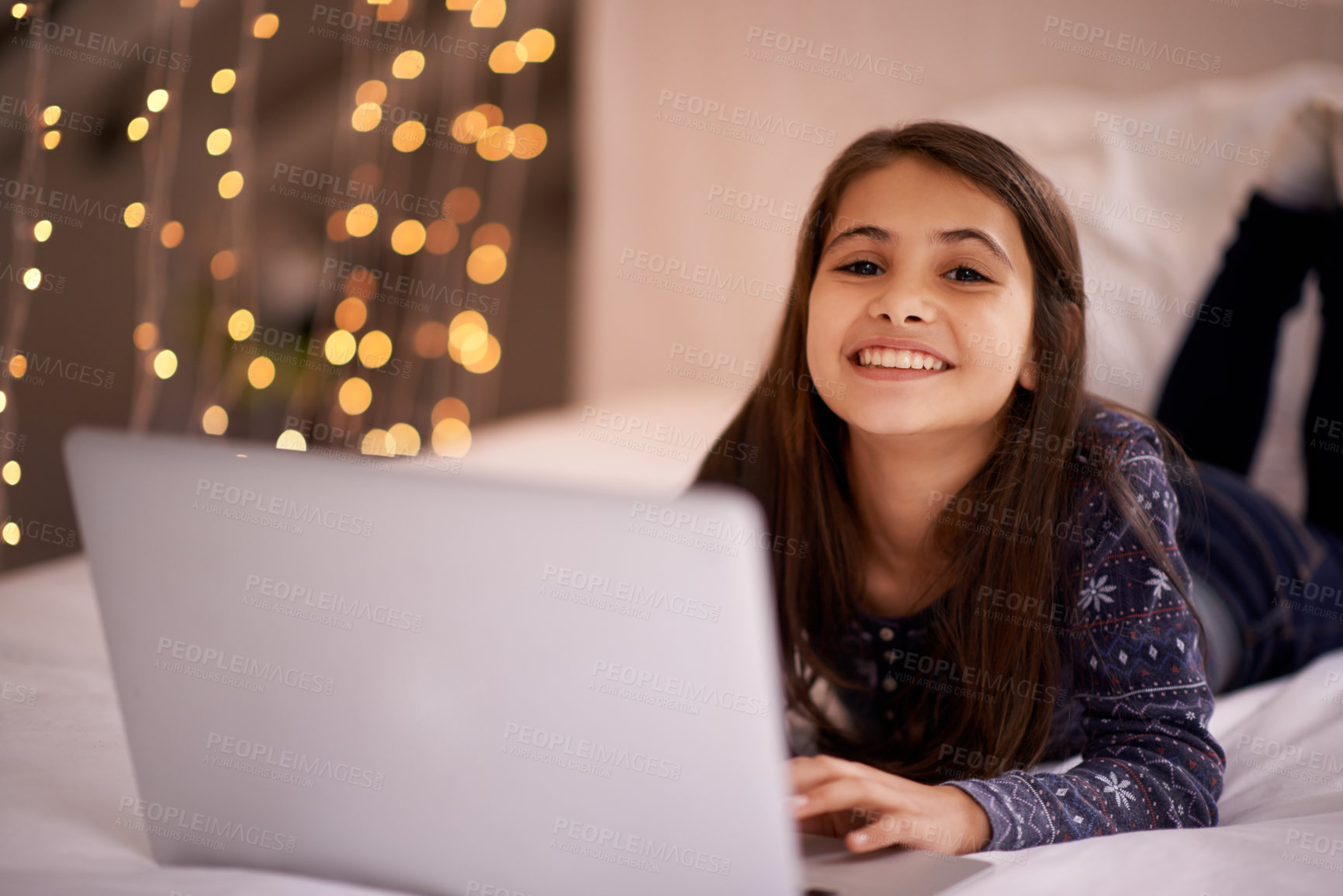 Buy stock photo Night, laptop and portrait of girl on a bed for cartoon, search or google it sign up at home. Computer, search and face of kid person in a bedroom with movie streaming, service or Netflix and chill