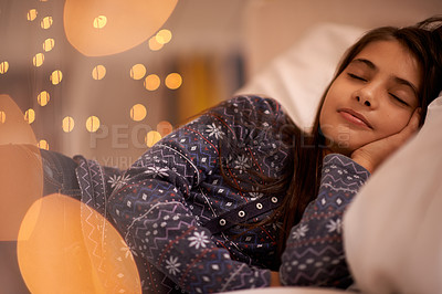 Buy stock photo Child, sleeping and bed for dream, tired and rest for young and growing up for adolescent indoor. Girl or kid with pajamas and laying with pillow for exhausted in house for peace and calm on bokeh 
