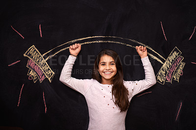 Buy stock photo Portrait of a young girl standing in front of a chalkboard drawing of a barbell