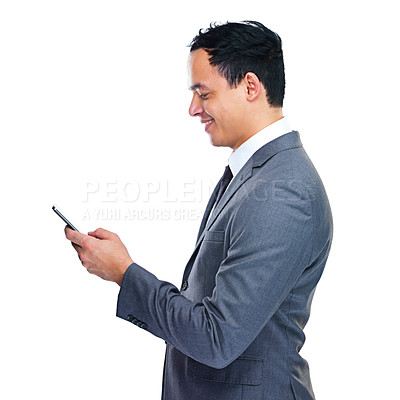 Buy stock photo Studio shot of a young businessman holding a cellohone