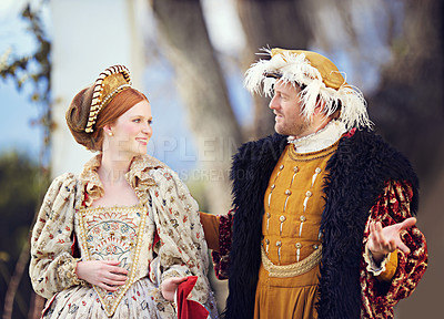 Buy stock photo Medieval, king and couple in history with renaissance fashion outdoor with marriage and love. Vintage, garden and royal leader with queen together on a lawn with conversation and theater costume 