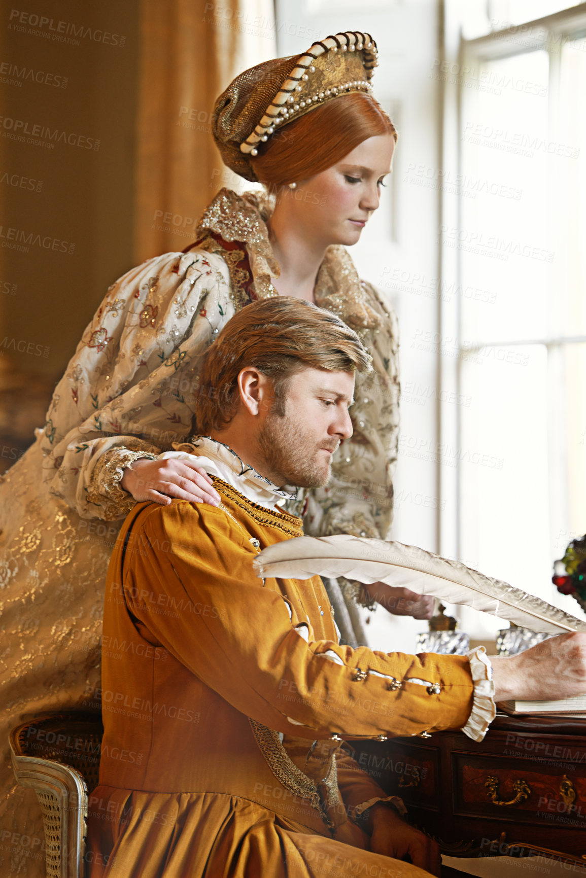Buy stock photo Couple, feather and writing a letter, together and relax in home for history in noble palace. People, love and bonding or notes in journal for plan, renaissance and aesthetic for support in marriage