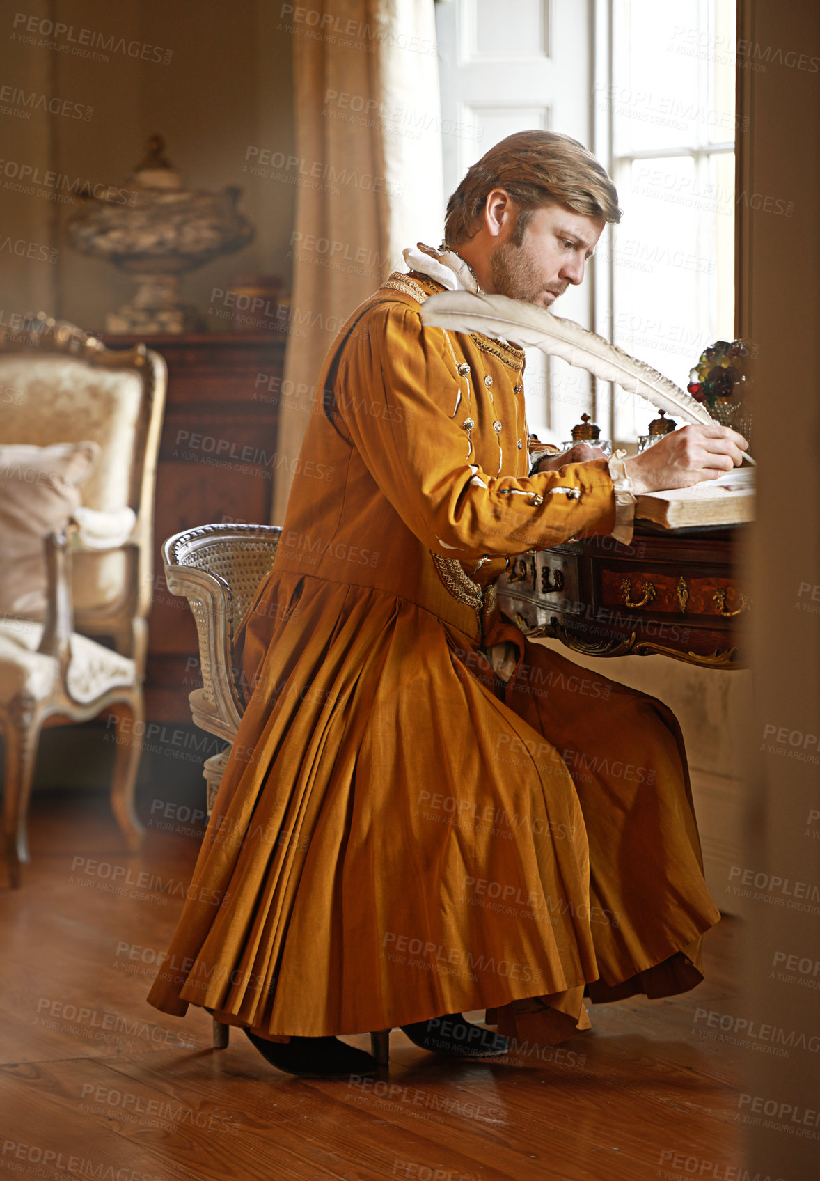 Buy stock photo King, medieval and writing with quill in book for renaissance, royalty aesthetic or letter in palace bedroom. Monarch, wealthy person and elegant clothes for cosplay, regal or communication in castle