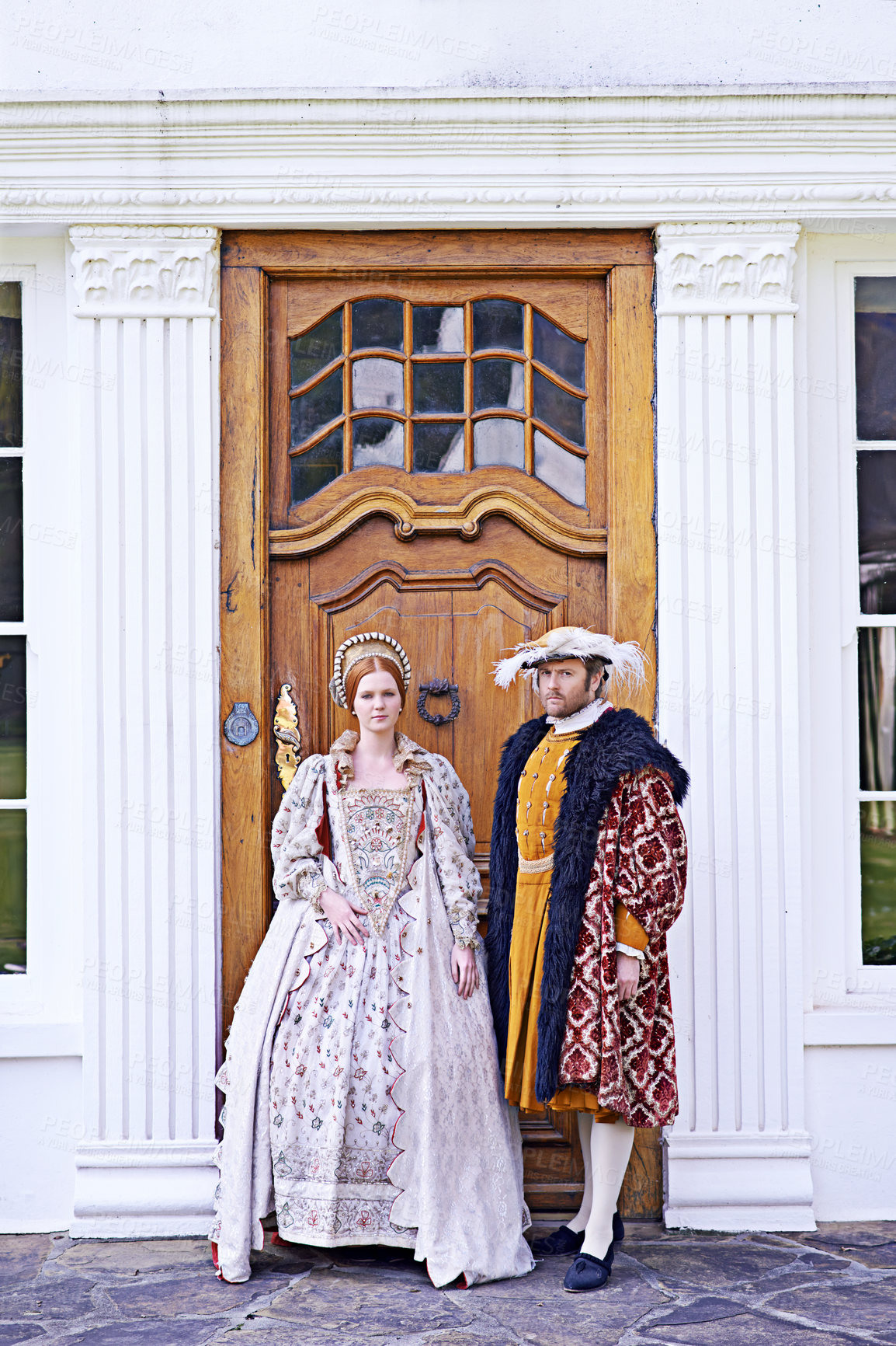 Buy stock photo King, renaissance couple and home with Victorian architecture, marriage and door with wealth. Real estate, ruler and history with royalty and historical manor with a house and traditional monarch