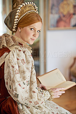 Buy stock photo Woman, queen and book with portrait for renaissance, royalty aesthetic and reading in palace bedroom. Monarch, wealthy person and elegant dress for cosplay, regal and medieval knowledge in the castle