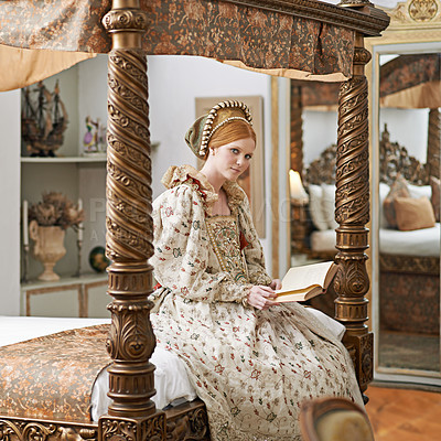 Buy stock photo Woman, queen and book with portrait for renaissance, royalty aesthetic and reading in palace bedroom. Monarch, wealthy person and elegant dress for cosplay, regal and medieval knowledge in the castle