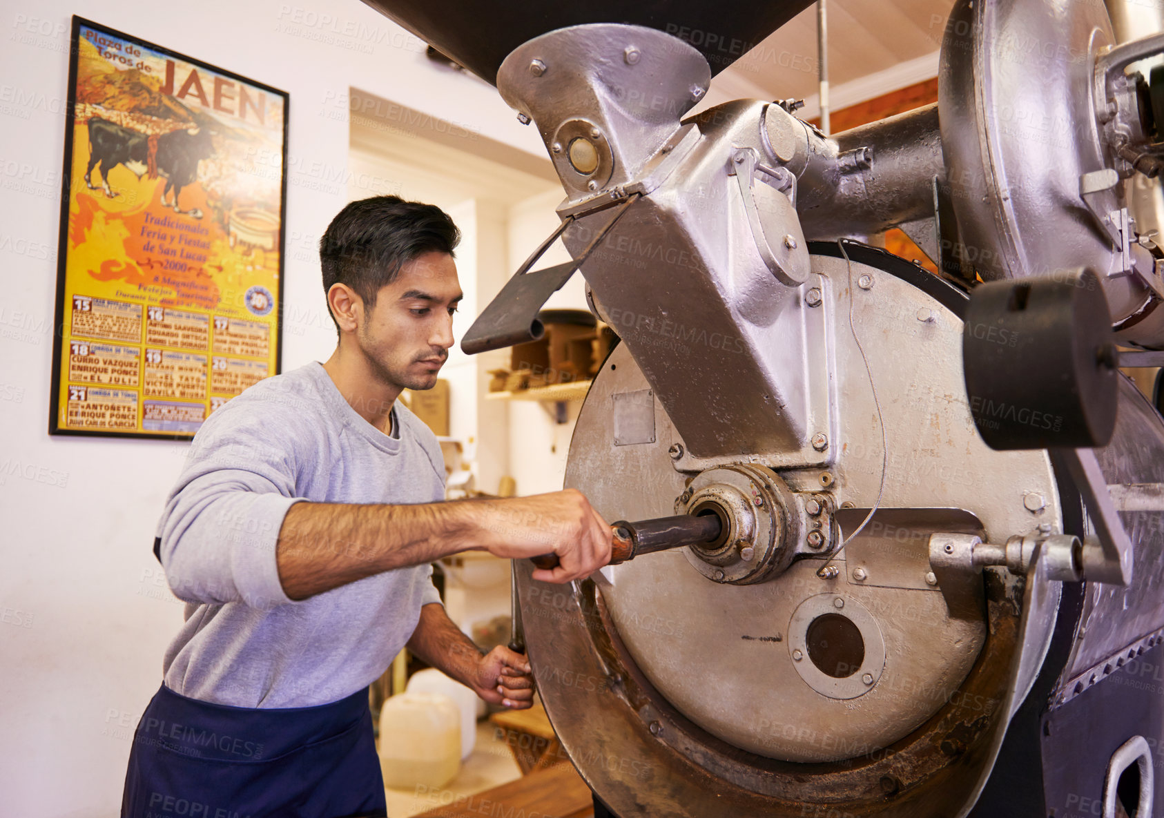 Buy stock photo Man, machine and industry for grinding coffee with roast, process and flavor for export in factory. Person, employee and tools for caffeine, beans or press with manufacturing at warehouse in Colombia