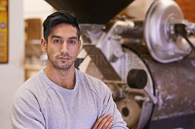 Buy stock photo Man, machine and portrait in manufacturing with coffee for roast, process and arms crossed in factory. Person, employee and tools for caffeine, beans or press for industry at warehouse in Colombia