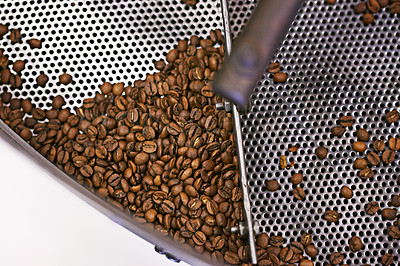 Buy stock photo Coffee beans, machine and industry in factory for roast, grinding or product for flavor, export or quality assurance. Plant, metal container and manufacturing for organic caffeine with sustainability