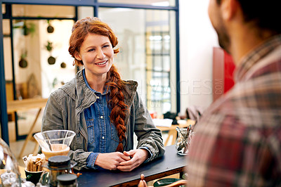Buy stock photo Woman, customer and waiter at counter in cafe for order, decision and talking for drink in morning. Girl, barista and catering service at trendy coffee shop for cappuccino, latte or espresso in Italy