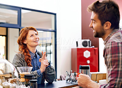 Buy stock photo Woman, customer service and waiter in a cafe, counter and decision with ideas, drink and smile in morning. People, man and order in a coffee shop with choice, happy and chat at restaurant in Italy