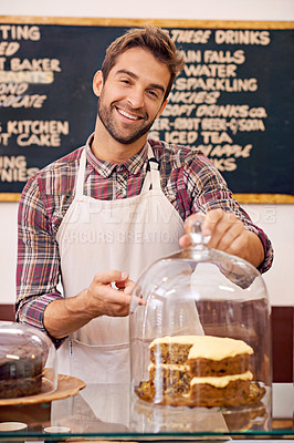 Buy stock photo Man, waiter and cake on counter in cafe for display, service or catering with smile in portrait. Person, barista or business owner in coffee shop, bakery or diner with pride, show and point in Italy