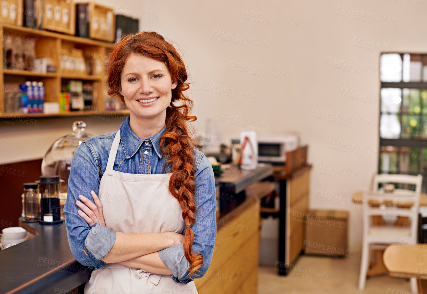 Buy stock photo Barista, woman and arms crossed in portrait at cafe with smile, pride and entrepreneurship. Person, waitress or business owner at coffee shop with confidence for service, catering and job in Dublin