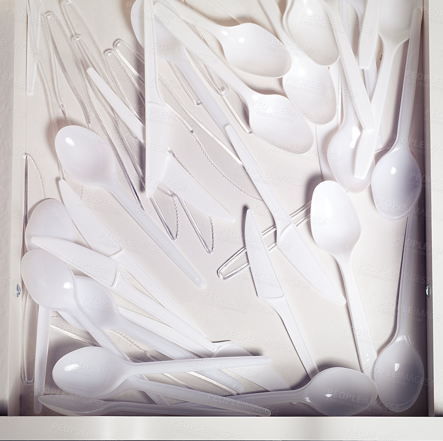 Buy stock photo A collection of plastic cutlery on a white background