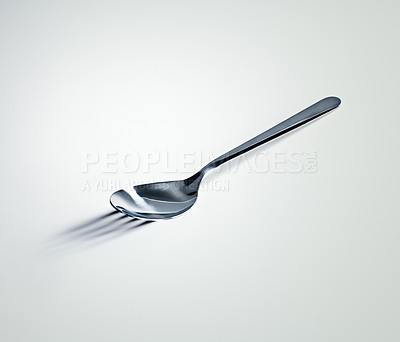 Buy stock photo Spoon, shadow and fork with mockup space, utensils and kitchen tool on a white studio background. Promotion, design and metal with artistic expression and bizarre with reflection, steel and mystery