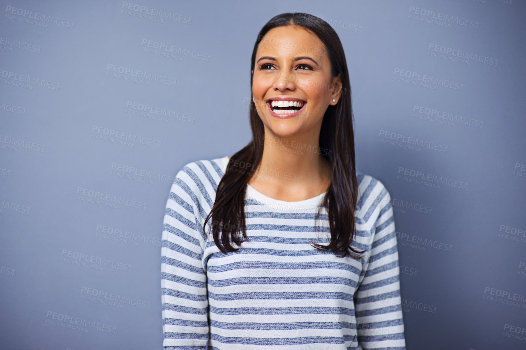 Buy stock photo Woman, laughing and fashion in studio with excited smile, thinking and ideas for memory by blue background. Girl, person and model with vision for clothes, style and happy to remember joke in Mexico