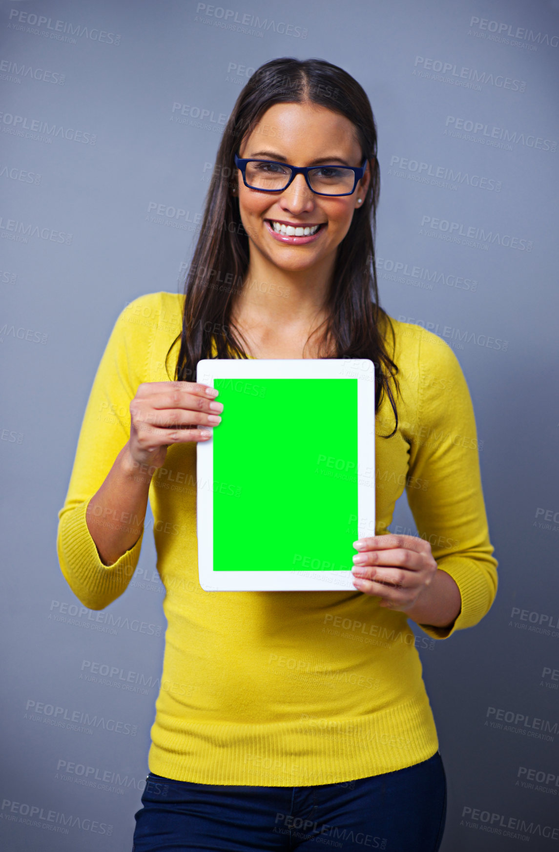 Buy stock photo Woman, tablet and green screen with mockup for studio portrait with presentation, show and ui by blue background. Student, person and digital touchscreen with chromakey for space, app and promotion