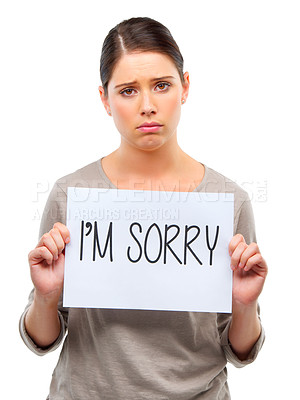 Buy stock photo Sad, portrait and woman with I'm sorry poster in studio with mistake, fail or regret on white background. Apology, face and female model frown with banner, announcement or broken heart presentation