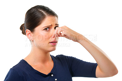 Buy stock photo Smell, yuck and portrait for woman with disgust facial expression for gross, fart and odor on white background. Young person and isolated with finger on nose for stink, wtf or scent on mockup

