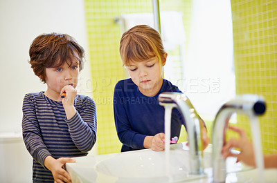 Buy stock photo Siblings, learning or children in home brushing teeth together for development in morning or bathroom. Boy, girl or kids cleaning mouth with tap or toothbrush for dental or oral health for wellness