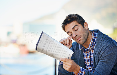 Buy stock photo Tired, newspaper and unemployed man in outdoor for search, job hunting and stress. Article, thinking and male person for frustrated, exhausted and disappointed with lack of employment opportunity