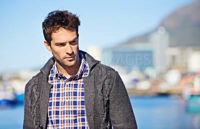 Buy stock photo Harbor, thinking and man on travel for holiday, adventure or vacation with memory or reflection. Ideas, outdoor and male person by sea port on weekend trip in Cape Town with planning face expression.