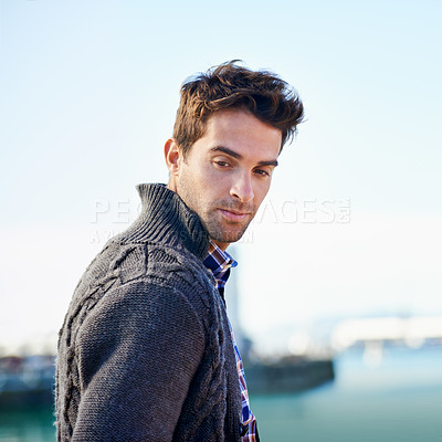 Buy stock photo Ocean, outdoors and man with thinking in city for travel, journey or weekend commute in Canada. Confident, male person and serious face with idea for holiday, vacation or getaway trip by sea