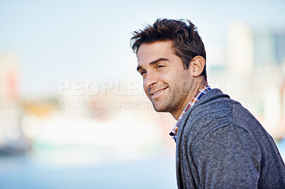 Buy stock photo Man, smile and mockup for outdoor and trip for travel or walk in urban or city with joy. Young person with joy and jacket and looking for view, comfort and relax for break and isolated aesthetic