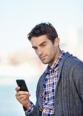 Buy stock photo Man, smartphone and texting at harbor on mobile network by sea for typing, contact or reading outdoor. Person, phone and click at urban port in city for notification, app or social media in Cape Town