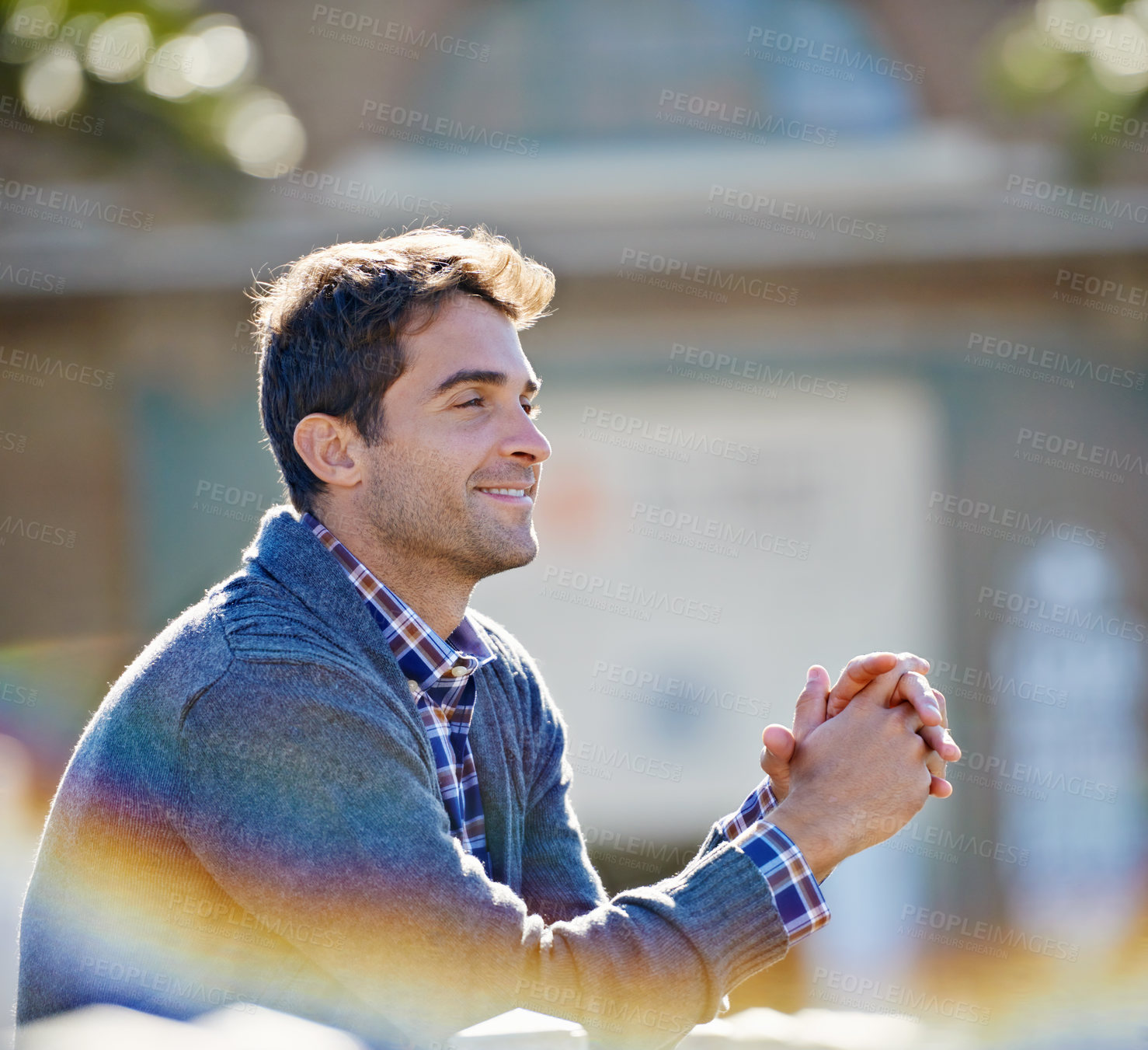 Buy stock photo Man, smile and outside for thinking memory and trip for travel or relax in outdoor for fresh air. Young person, sitting and cheerful and looking for view and break for good mood and joy on vacation  