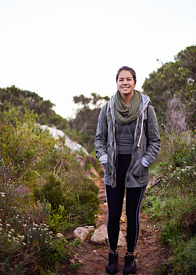 Buy stock photo Woman, hiking and happy in nature for portrait on path with fitness, outdoor or adventure on holiday. Girl, person and smile for trekking in bush, hill and rocks for journey on vacation in Cape Town