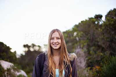 Buy stock photo Outdoor, nature and portrait of girl with smile for hiking with backpack for journey in foliage or bush. Adult, female person and woman with happiness for travel for winter holiday in Cape Town