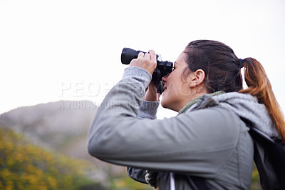 Buy stock photo Woman, binoculars and hiking mountain for nature view on trekking path for explore, adventure or journey. Female person, backpacking and travel workout in wilderness fitness, vacation or environment