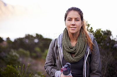 Buy stock photo Woman, hiking and outdoor for portrait with bottle for water with fitness, hydration or smile on adventure. Girl, person and trekking in nature, mountains or bush for journey on vacation in Cape Town