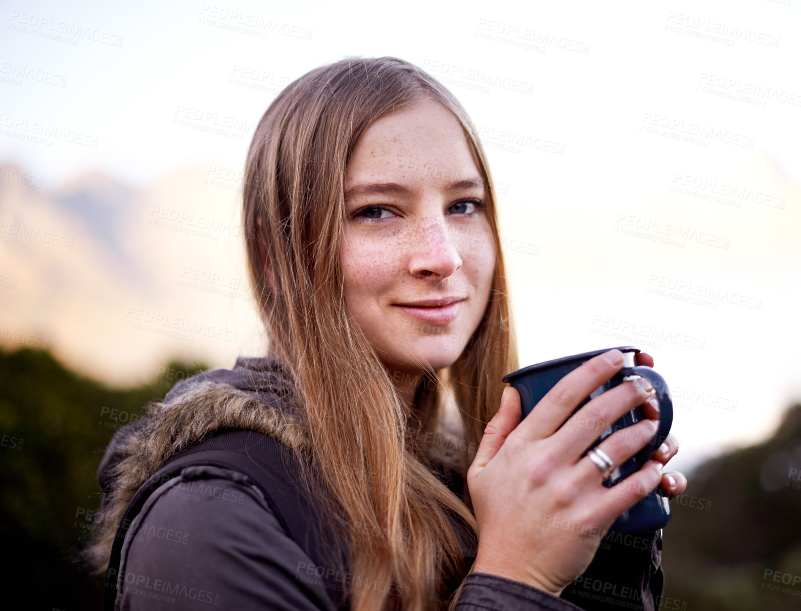 Buy stock photo Hiking, portrait and woman drinking coffee outdoor on vacation, adventure and travel in the morning in Switzerland. Face, tea cup and person trekking in nature or environment in winter on holiday