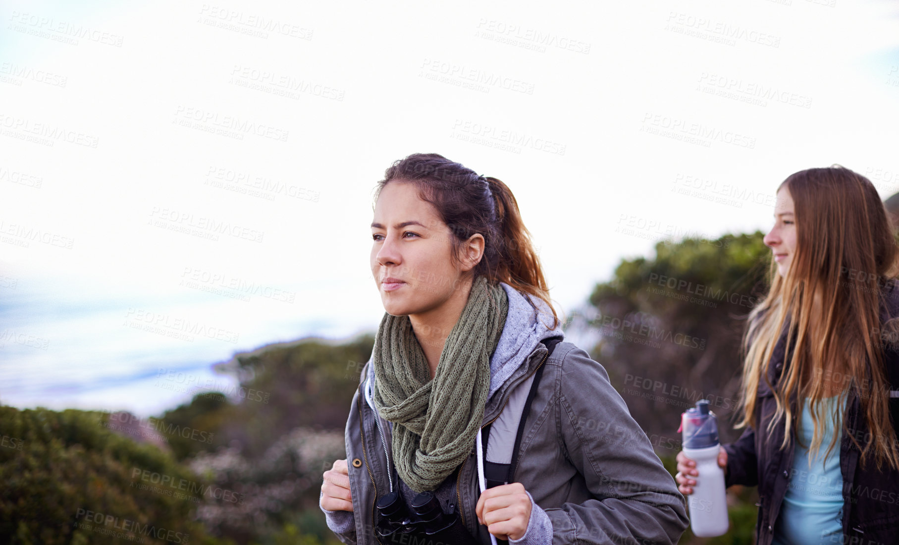 Buy stock photo Backpackers, friends and women on journey, nature and bonding with adventure on vacation and outdoor. Hiking, hobby and physical activity for people on holiday, travel and location with scenery
