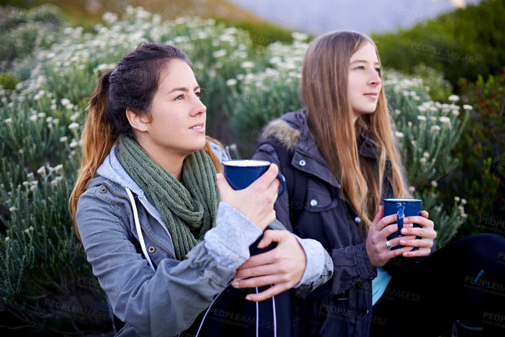 Buy stock photo Hiking, women and friends drinking coffee in nature, thinking or relax in environment. Trekking, outdoor or girls with tea cup on holiday, adventure or travel on vacation together for journey by bush