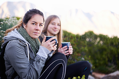 Buy stock photo Hiking, woman and portrait of friends drinking coffee outdoor or relax in environment. Trekking, nature and face of girls with tea cup on adventure, travel and serious people on vacation together