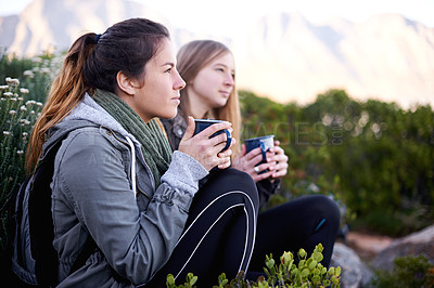 Buy stock photo Hiking, women and friends drinking coffee outdoor, thinking or relax in environment. Trekking, nature and girls with tea cup on adventure, travel and serious on vacation together for journey by bush